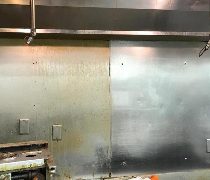 commercial kitchen fire damage with soot on walls